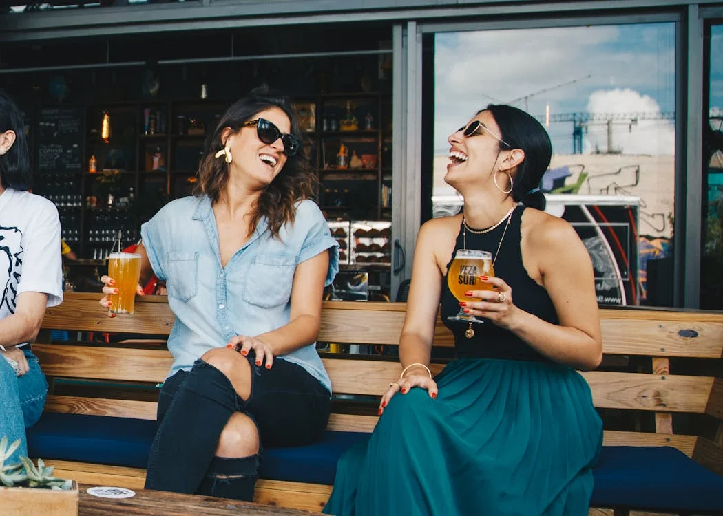 {{https://mixerdates.com/?ch=mixerblog}}Friends gathering at a local Latin restaurant, sharing stories and laughter